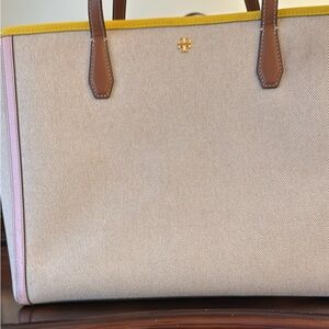 Tory Burch tote bag with leather accents and leather pouch inside.  Like new